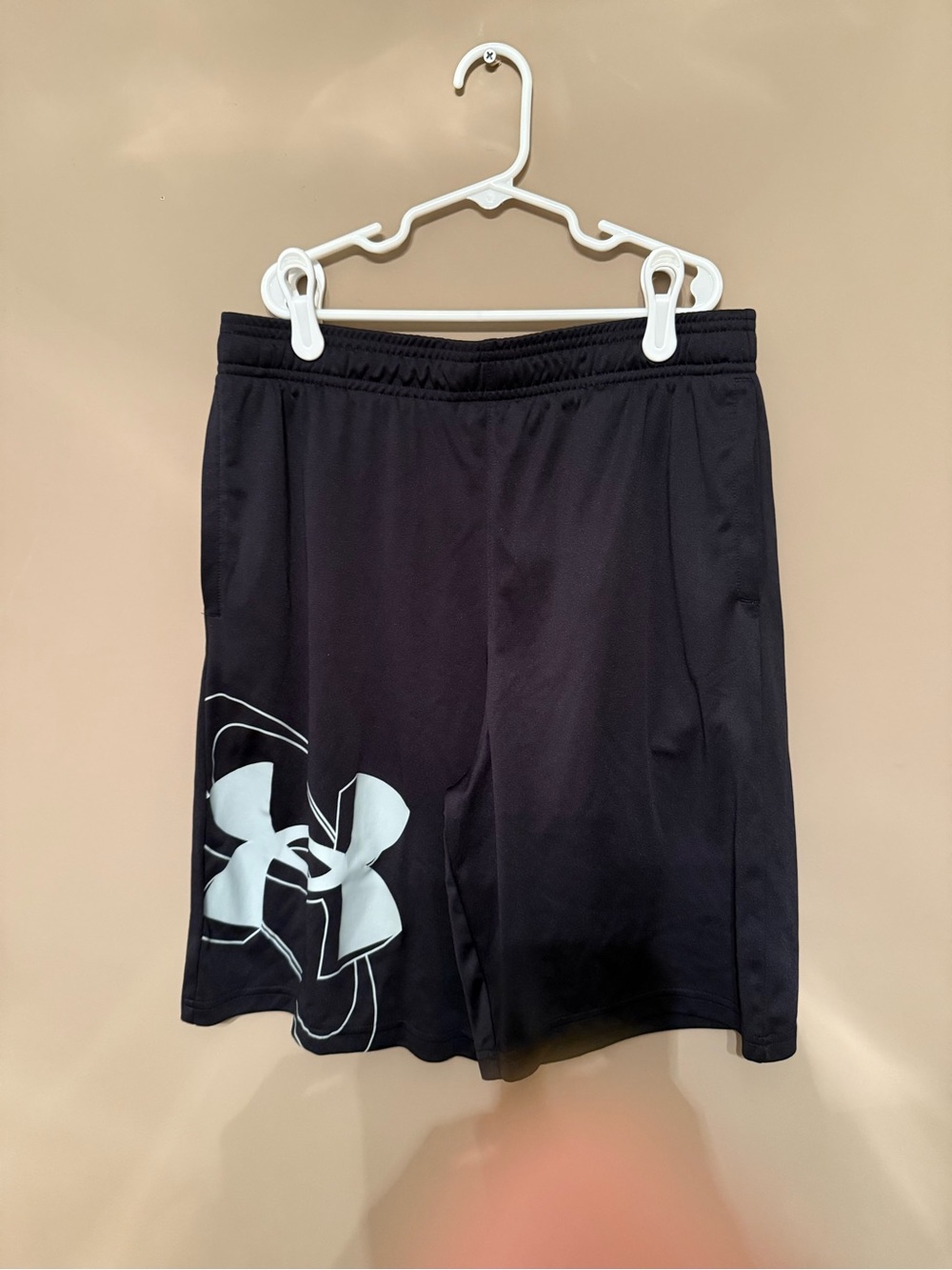 Under Armour brand black athletic shorts in excellent condition, size XL